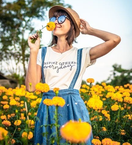 woman smelling flowers helps in character design